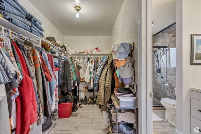View of spacious closet | Image 29