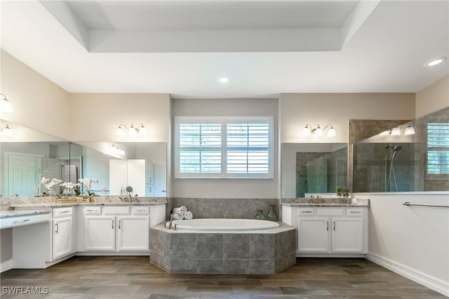Large primary bathroom with soaking tub and walk-in shower | Image 23