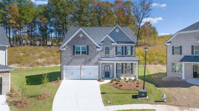 563 E Princeton Elm Place E, House other with 4 bedrooms, 3 bathrooms and 2 parking in Lawrenceville GA | Image 1