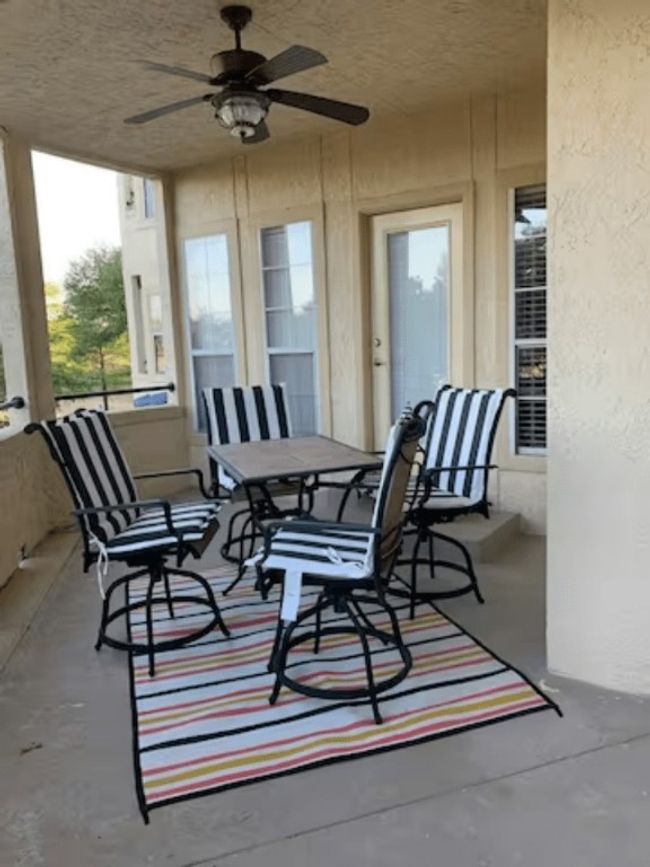 View of patio / terrace featuring a ceiling fan and outdoor dining space ((Furniture not included)) | Image 10