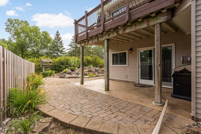 The Lower Level walks out to a huge stamped concrete patio that is perfect for grilling or lounging. | Image 30