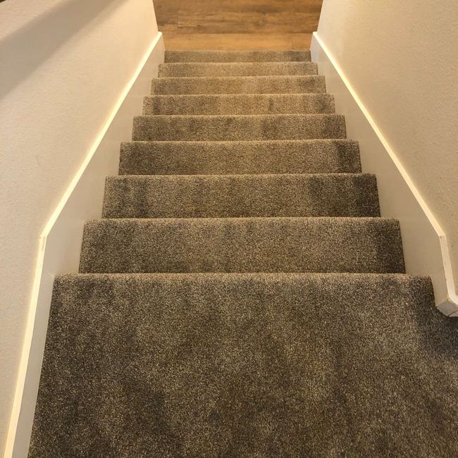 Stairway featuring wood finished floors | Image 9