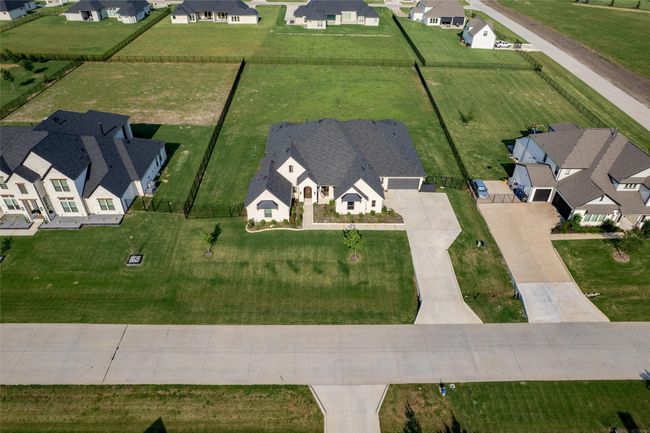 Aerial view of property's location featuring nearby suburban area | Image 34