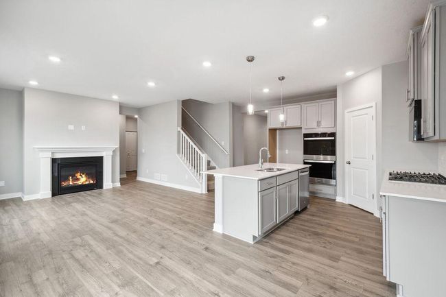 Open, inviting, and perfect for entertaining and life. Model photo. Options and colors will vary. | Image 12