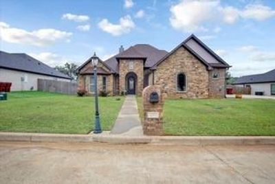 View of front of house with a front yard | Image 1