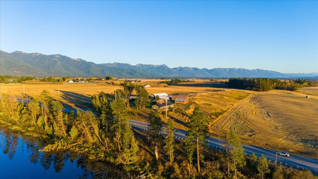 Aerial view featuring a rural view and a water and mountain view | Image 58