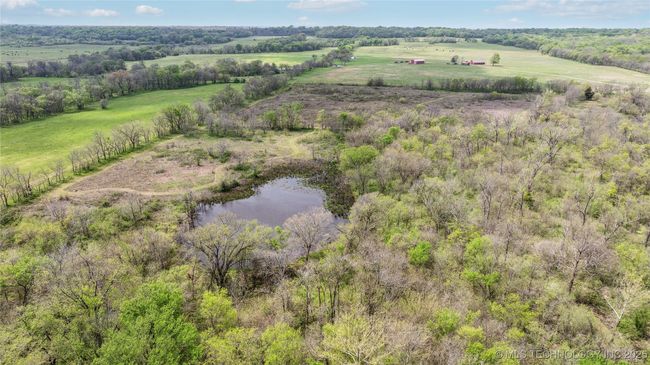 Overview of rural landscape featuring a large body of water | Image 47