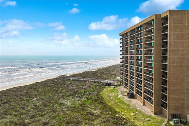 401 Sandpiper is a fourth floor end unit facing the beach and bay and pool. | Image 39