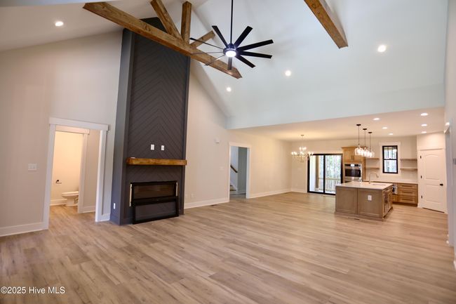 Vaulted ceiling & electric fireplace in Living Room | Image 7