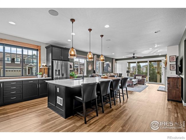Large open main level living leaves lots of spaces for formal and informal living | Image 8