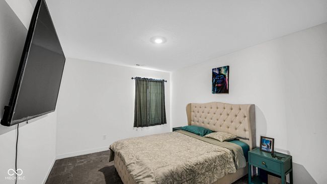 bedroom with dark carpet, baseboards, and recessed lighting | Image 24