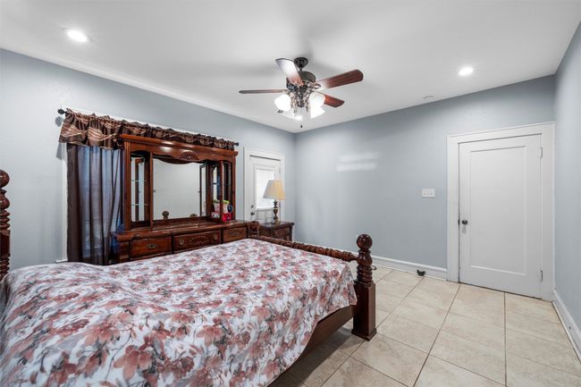 Tiled bedroom featuring recessed lighting and ceiling fan | Image 15
