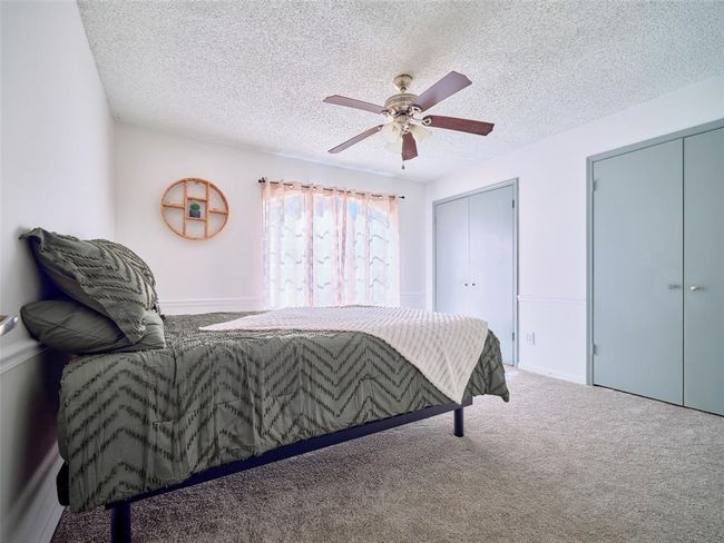 One of four of the spacious upstairs bedrooms. | Image 24