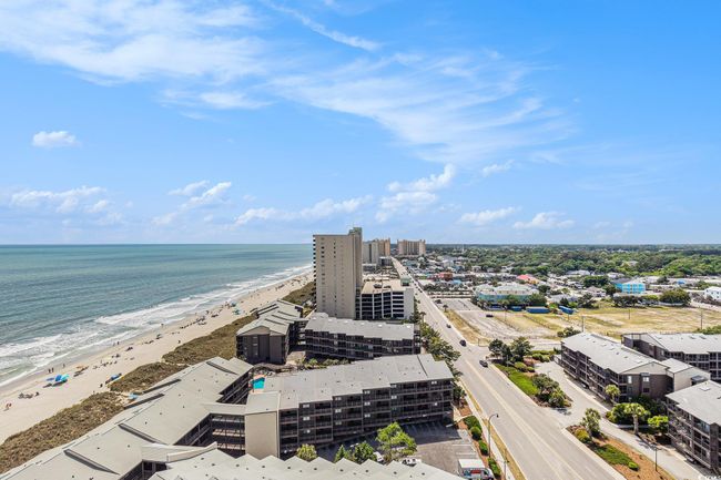 Drone / aerial view of waterfront with a beach | Image 25