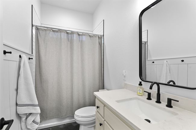 Bathroom with toilet and vanity | Image 25