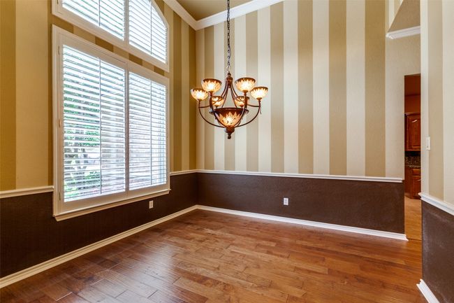 Dining room with plantation shutters | Image 22