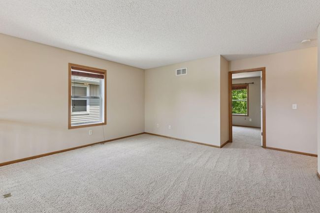 This is a great space for lounging, TV watching or a home office | Image 11