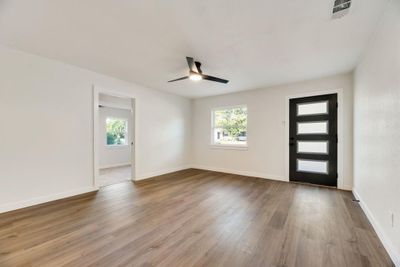 Foyer entrance featuring ceiling fan and hardwood / wood-style floors | Image 2