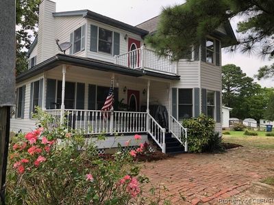 View of front facade featuring covered porch | Image 1