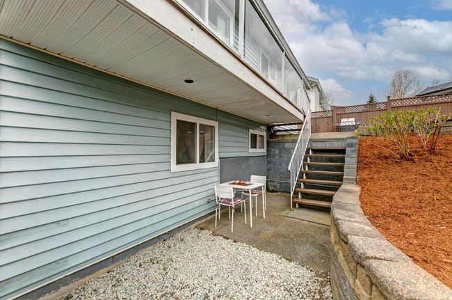 View of patio featuring stairs and fence | Image 38
