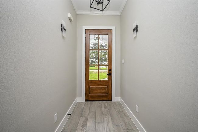 Greeting You At The Front Entrance Is A Beautiful & Modern Glass Window Front Door. The Foyer Is Also A Nice Touch That Gives A Peak Inside The Home Before Entering The Main Areas | Image 5