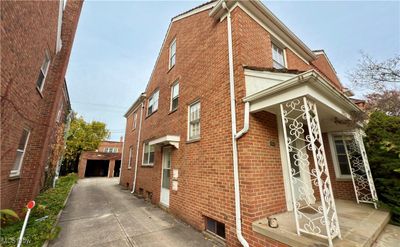 View of property exterior with an outbuilding and a garage | Image 3