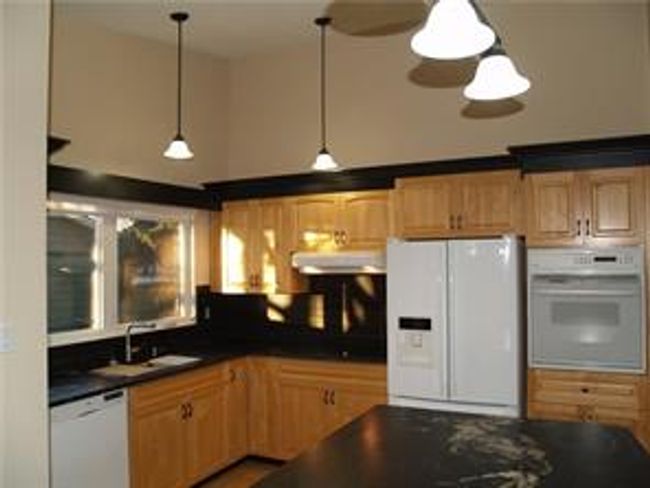 10727 Maplecrest Rd Se, House detached with 3 bedrooms, 3 bathrooms and 3 parking in Calgary AB | Image 4