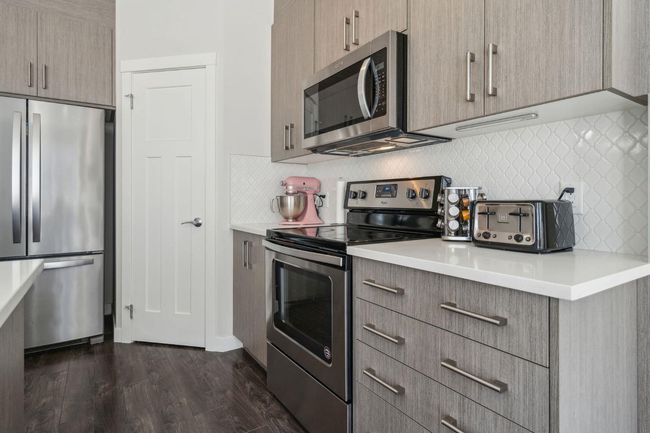 35 Sage Bluff Heights Nw, Home with 3 bedrooms, 3 bathrooms and 2 parking in Calgary AB | Image 7