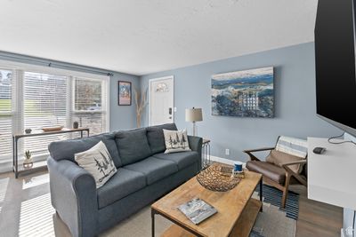 Living room featuring wood-type flooring | Image 3