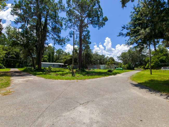 Intersection, corner view. Google search for direction: 23PM+PCP Ocklawaha, Florida | Image 1