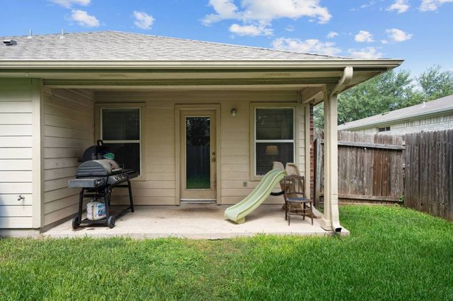 Back of property with a covered patio | Image 26