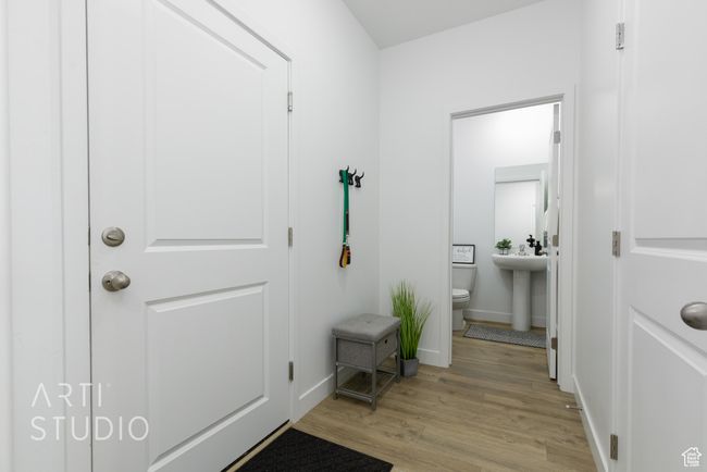 Interior space featuring baseboards and light wood-style floors | Image 7