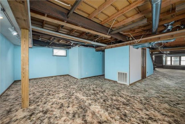Below grade area featuring carpet and visible vents | Image 27