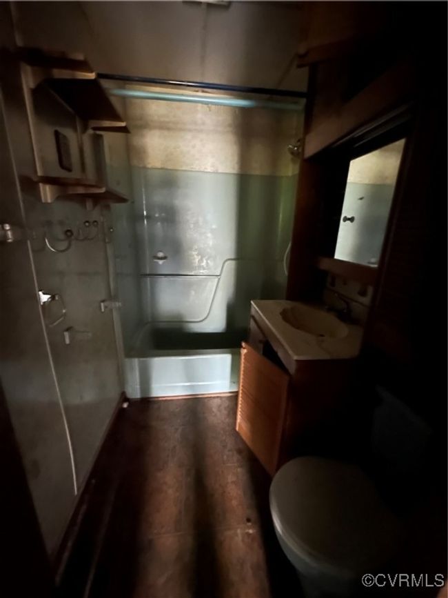 Full bath with toilet, wood finished floors, and vanity | Image 11