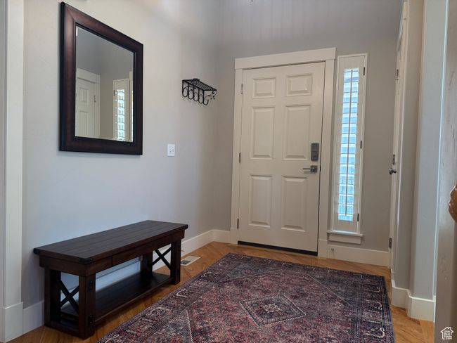 Entryway featuring hardwood floors | Image 10