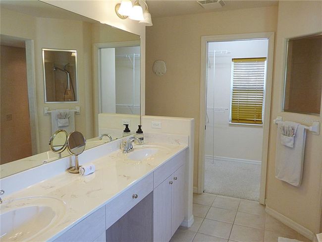 wide counter top with space for her make up and full storage cabinet | Image 39