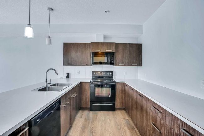201 - 70 Saddlestone Dr Ne, Townhouse with 2 bedrooms, 3 bathrooms and 1 parking in Calgary AB | Image 9