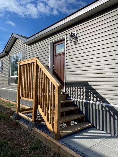 19 Maple Dr W, Home with 3 bedrooms, 2 bathrooms and 2 parking in Brooks AB | Image 2