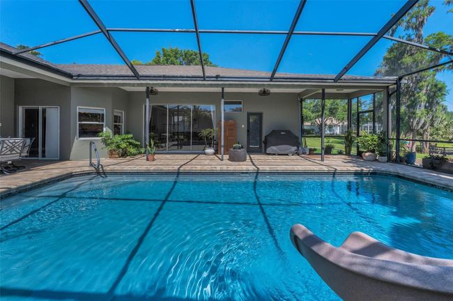 Family room sliders - pool bath access | Image 42