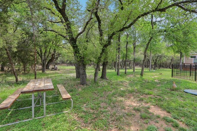 View of yard with fence | Image 28