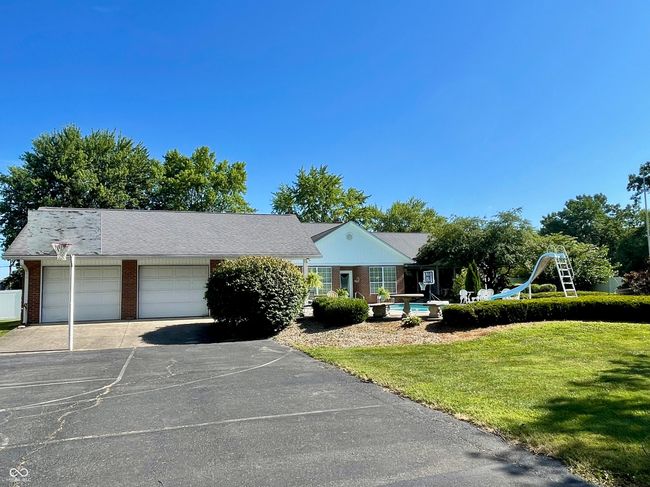 Added detached garage/pool house view from backyard | Image 12