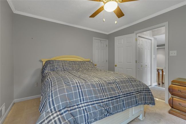 This the 3rd bedroom. This could easily be utilized as a office/den or seperate TV area. You can see it is located just off the entrance and living room. | Image 18