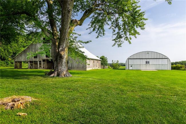 View of yard featuring an outdoor structure | Image 32