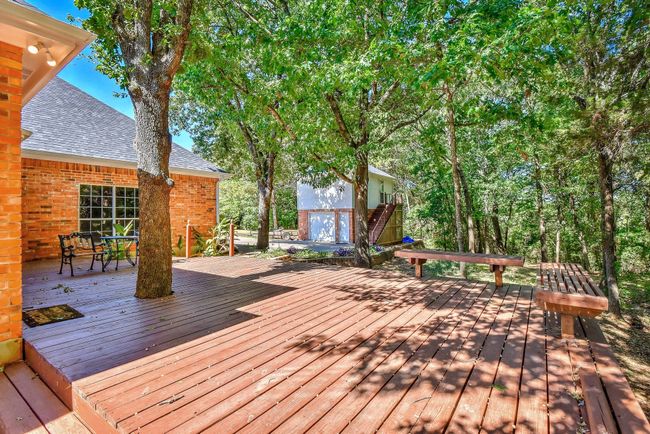 Wooden terrace with outdoor dining area | Image 33