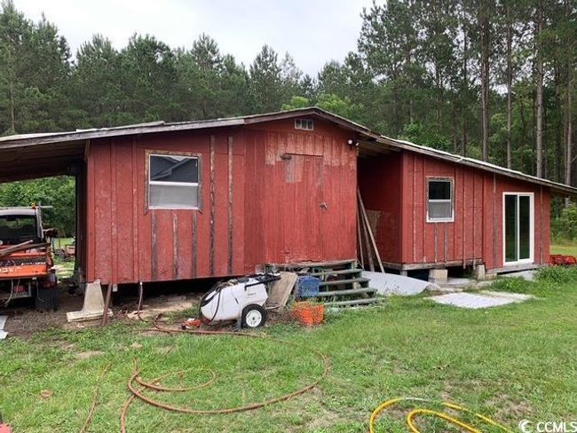 View of outdoor structure featuring entry steps | Image 26