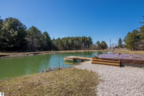 13353 Campbell Rd, Kewadin, MI, 49648-8991 | Card Image