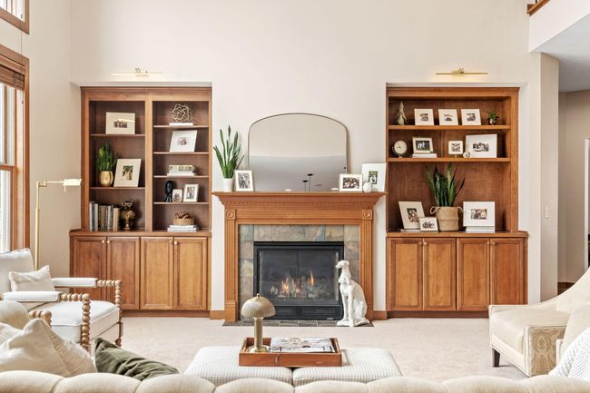 Beautiful built-ins anchor the fireplace and add just the right amount of charm. | Image 10