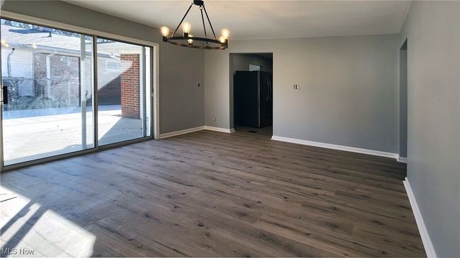 Family room opens to concrete patio | Image 7