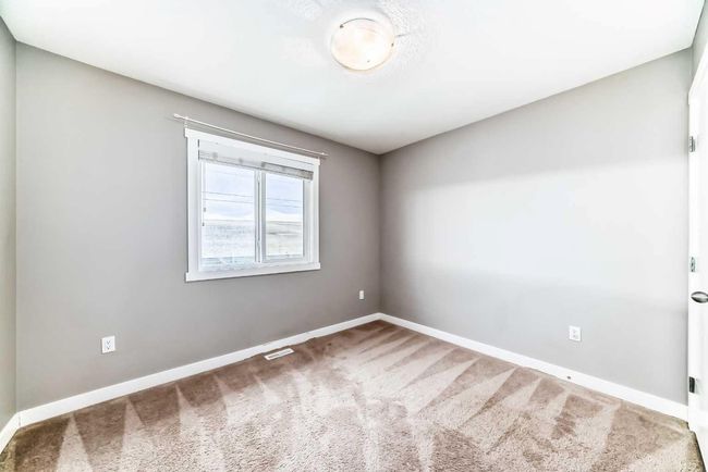 23 Baysprings Way Sw, Home with 3 bedrooms, 3 bathrooms and 1 parking in Airdrie AB | Image 32