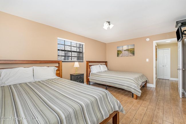 Upstairs West Bedroom with View of Ocean and Pier | Image 29